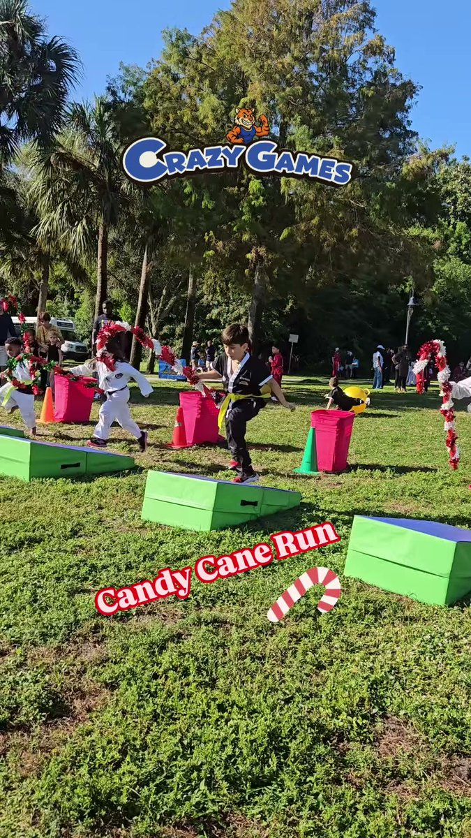 Kids running the Crazy Games FL Candy Cane Run holiday relay race in a South Florida park