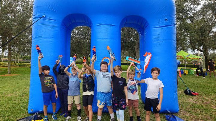 Nerf Wars at the park at a Crazy Games event