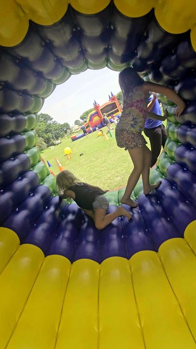 Boca Chamber: girls in the wheel at a Crazy Games event
