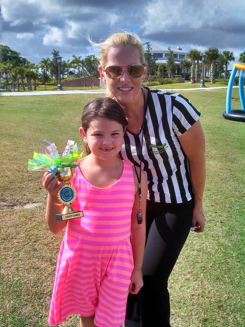 Our referee + a proud winner at a Crazy Games event