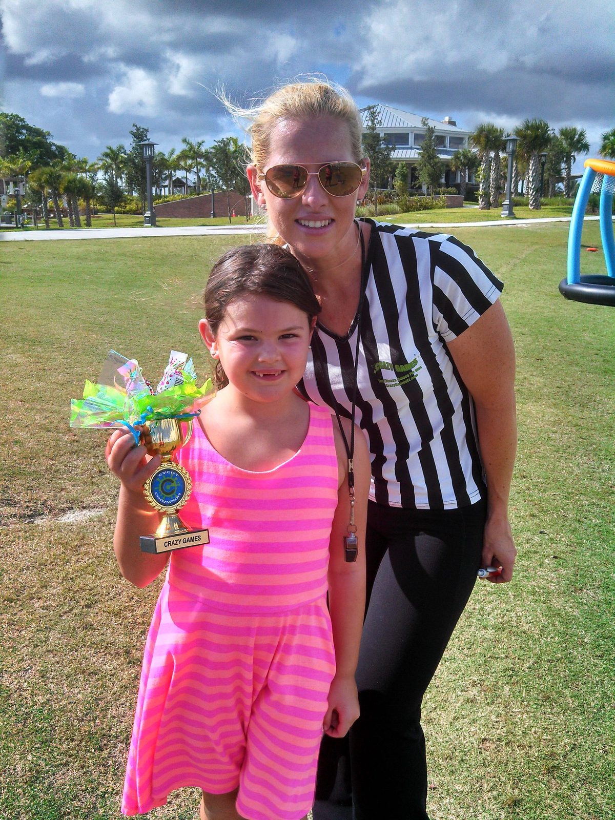 Our referee + a proud winner at a Crazy Games event
