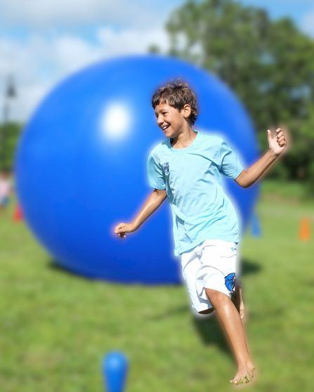 Giant Push Ball at a Crazy Games event