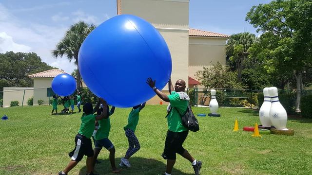 Giant Push Ball at a Crazy Games event