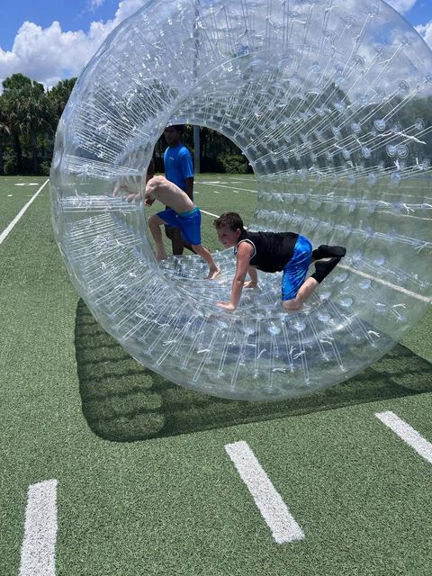 Clear Hamster Wheels at a Crazy Games event