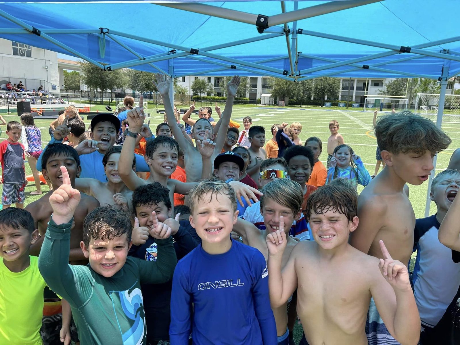 Camp crew cheers at a Crazy Games event