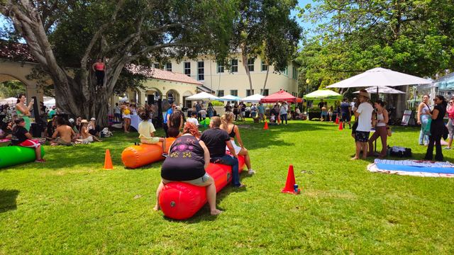 Giant Inflatable Rolling Logs at a Crazy Games event