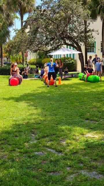 Giant Inflatable Rolling Logs at a Crazy Games event