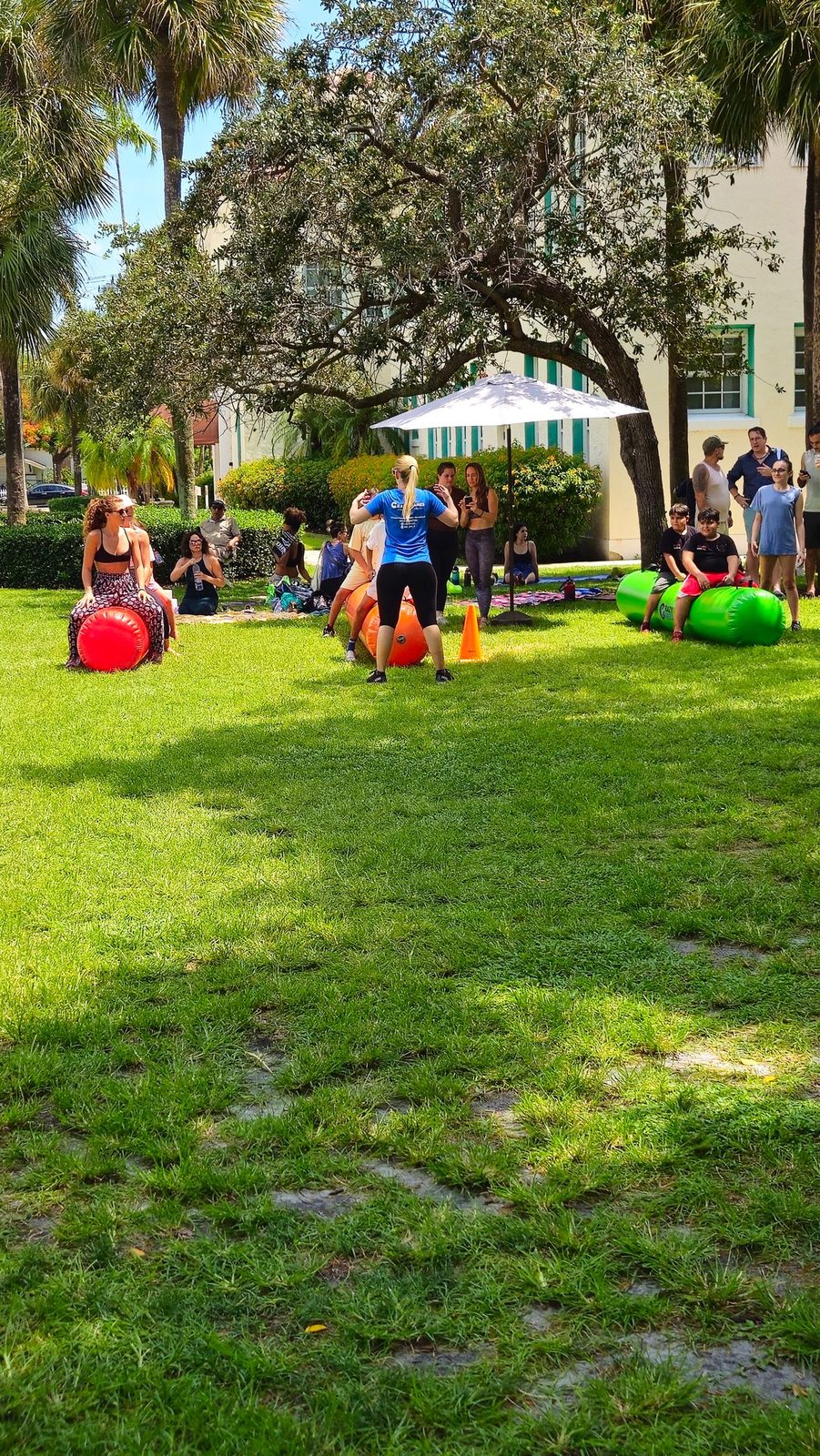 Giant Inflatable Rolling Logs at a Crazy Games event