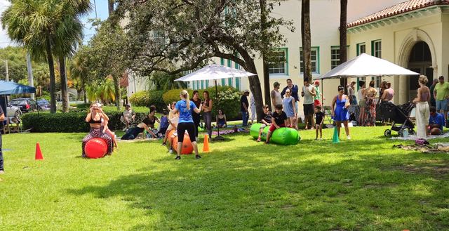 Giant Inflatable Rolling Logs at a Crazy Games event