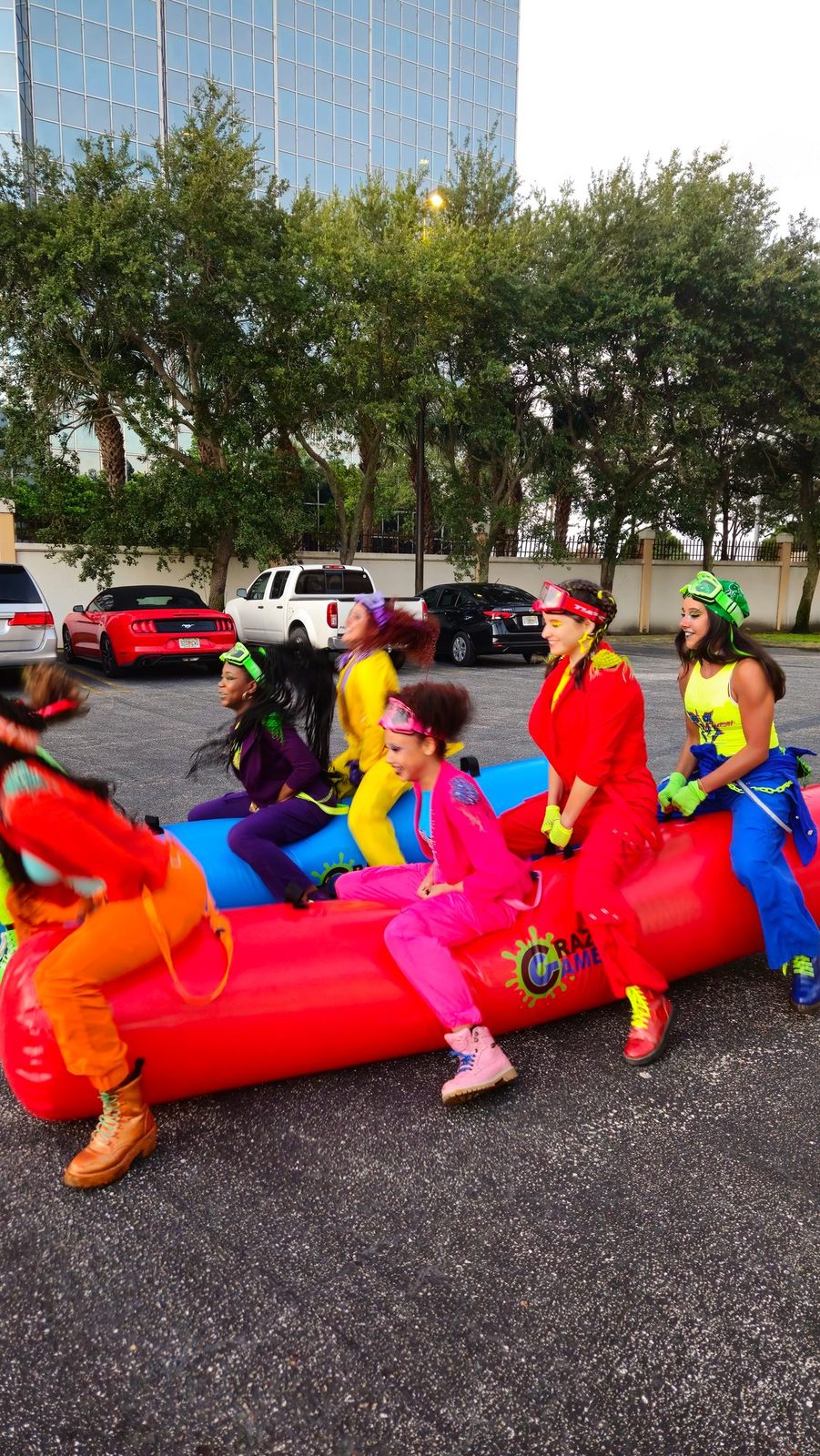 Giant Inflatable Rolling Logs at a Crazy Games event