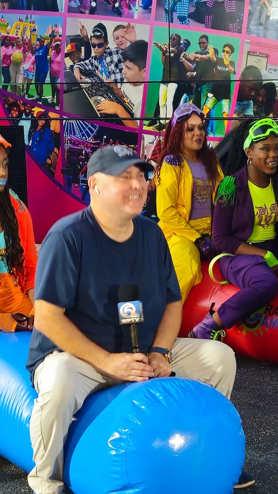 Giant Inflatable Rolling Logs at a Crazy Games event