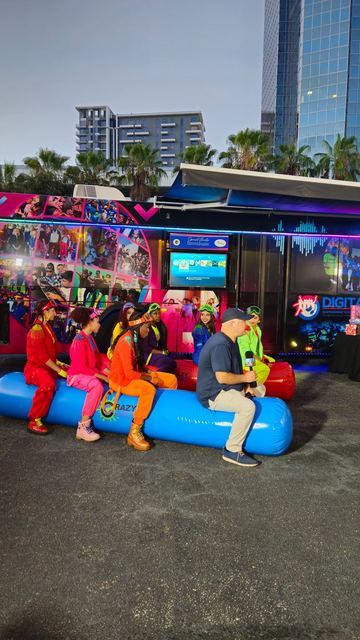 Giant Inflatable Rolling Logs at a Crazy Games event