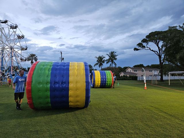 Human Hamster Wheels at a Crazy Games event