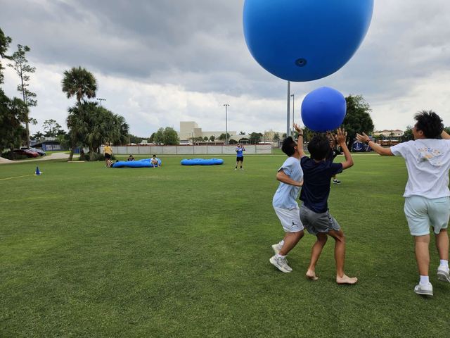 Giant Push Ball at a Crazy Games event