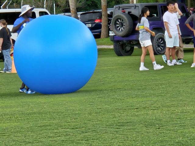 Giant Push Ball at a Crazy Games event