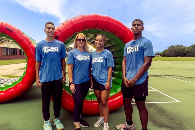 Our crew + hamster wheels at a Crazy Games event