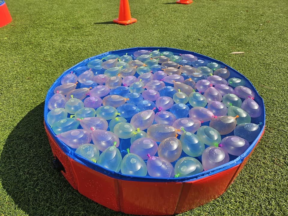 Water Bomb Relay at a Crazy Games event