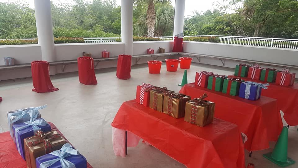 Kids playing Crazy Games holiday games at a real Palm Beach County event