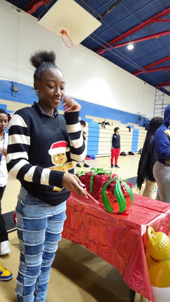 Kids playing Crazy Games holiday games at a real Palm Beach County event