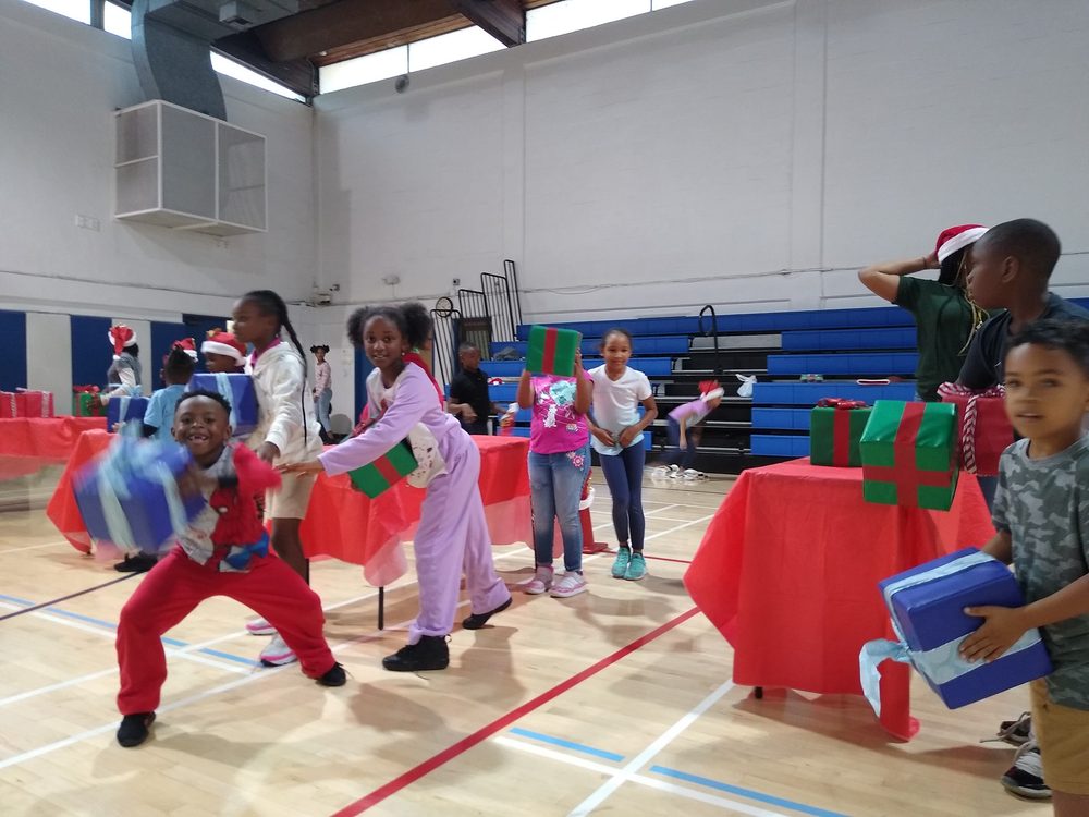 Kids playing Crazy Games holiday games at a real Palm Beach County event