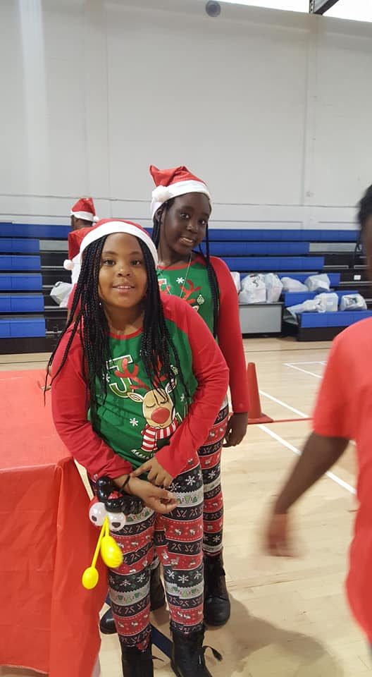 Kids playing Crazy Games holiday games at a real Palm Beach County event