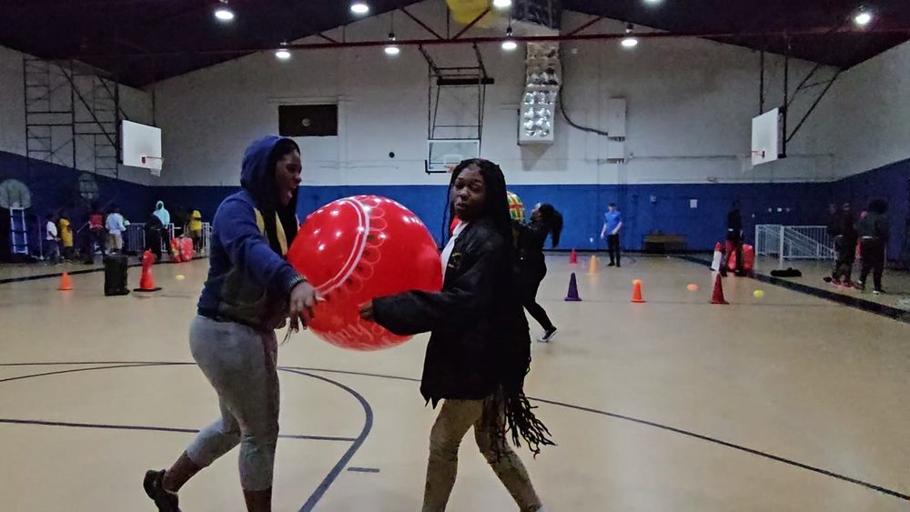 Kids playing Crazy Games holiday games at a real Palm Beach County event