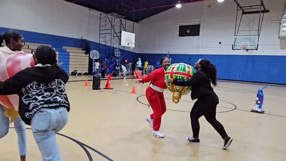 Kids playing Crazy Games holiday games at a real Palm Beach County event