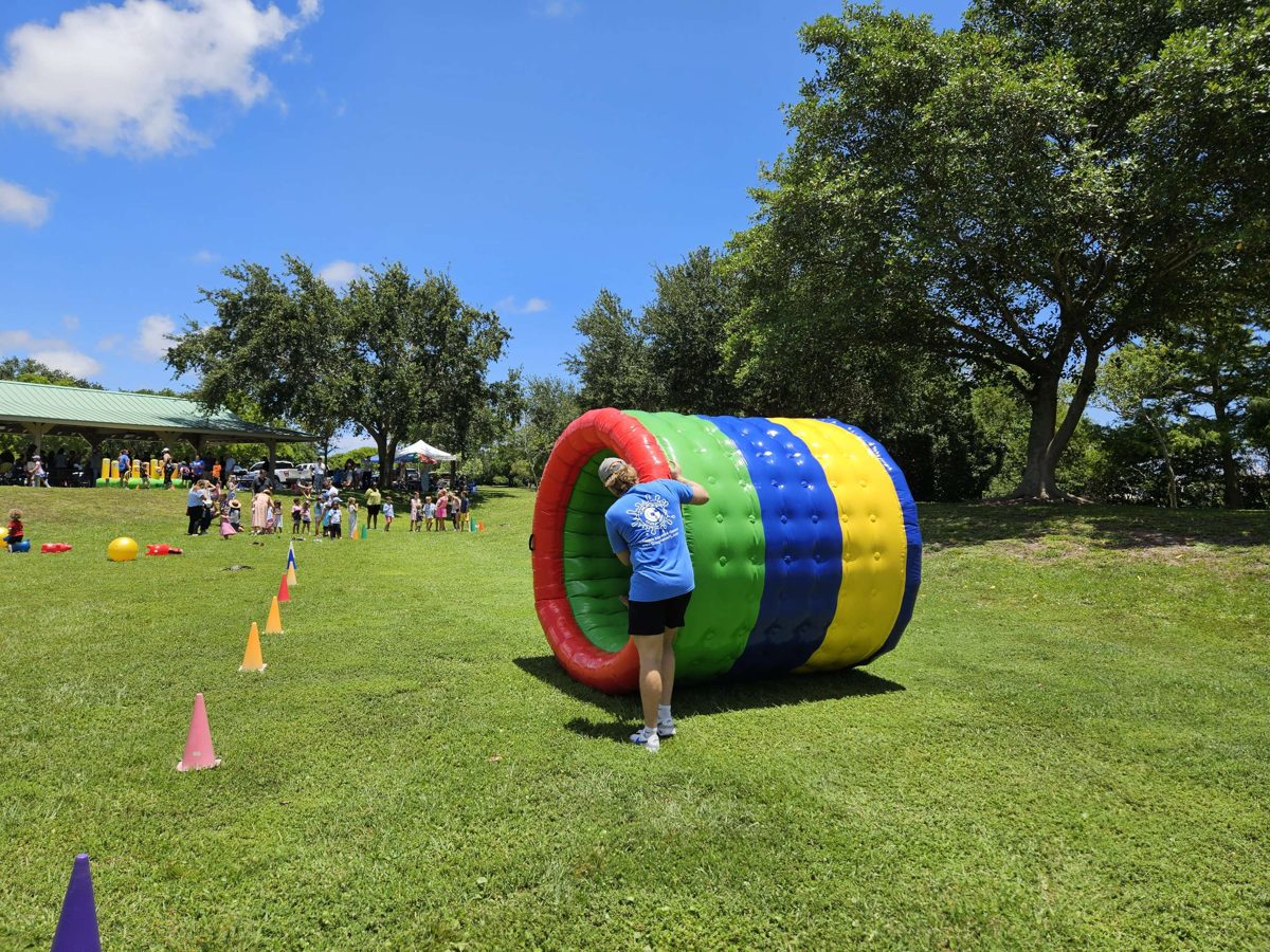 Human Hamster Wheels set up on a park field for a birthday party in Palm Beach County