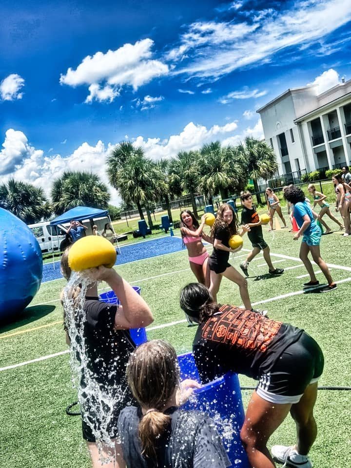 Kids playing Crazy Games interactive games at a real Palm Beach County event