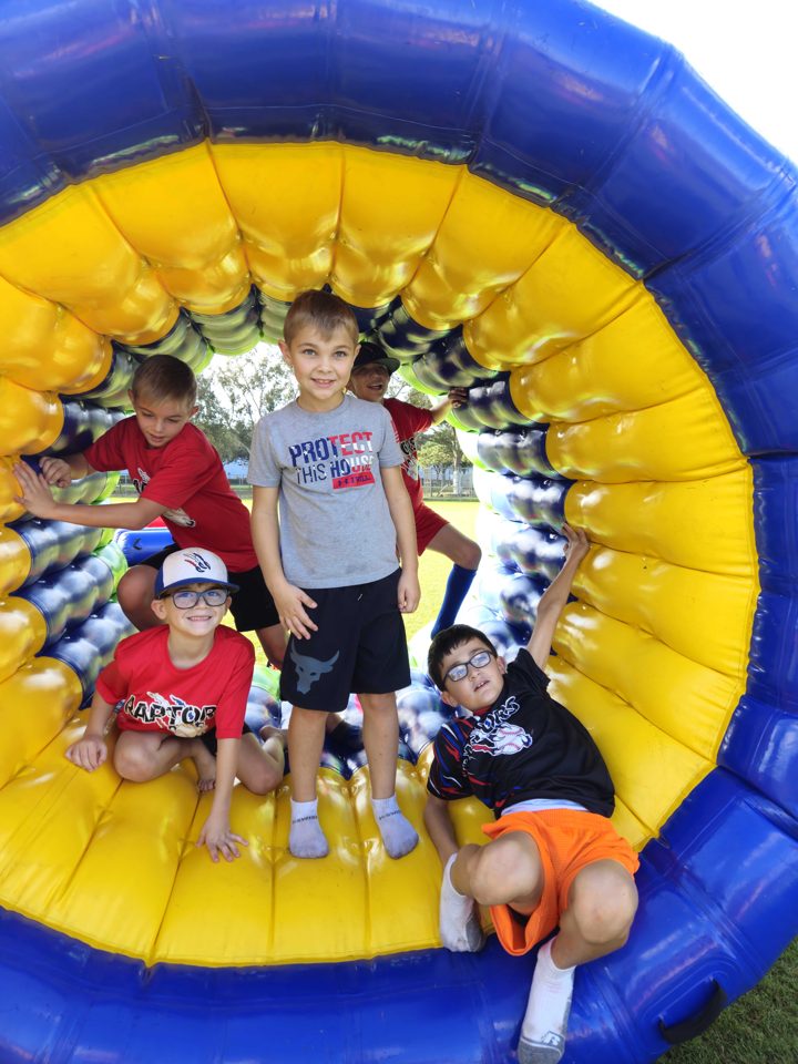 Kids playing Crazy Games interactive games at a real Palm Beach County event
