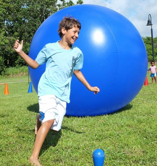 Kids playing Crazy Games interactive games at a real Palm Beach County event