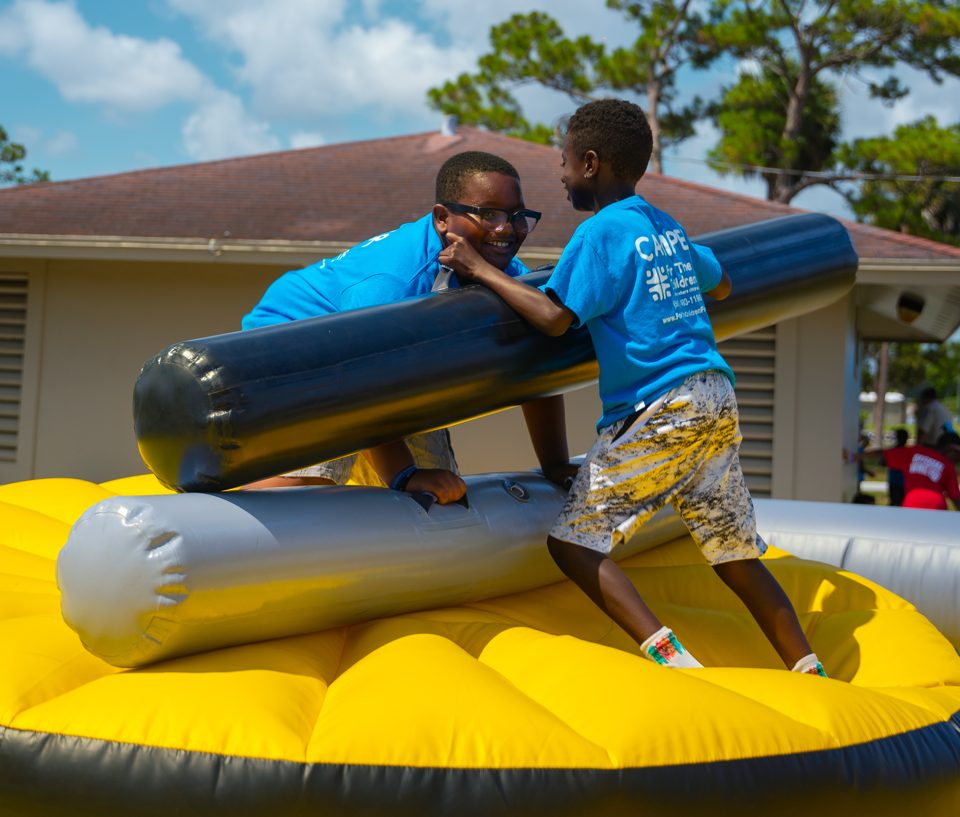 Kids playing Crazy Games interactive games at a real Palm Beach County event