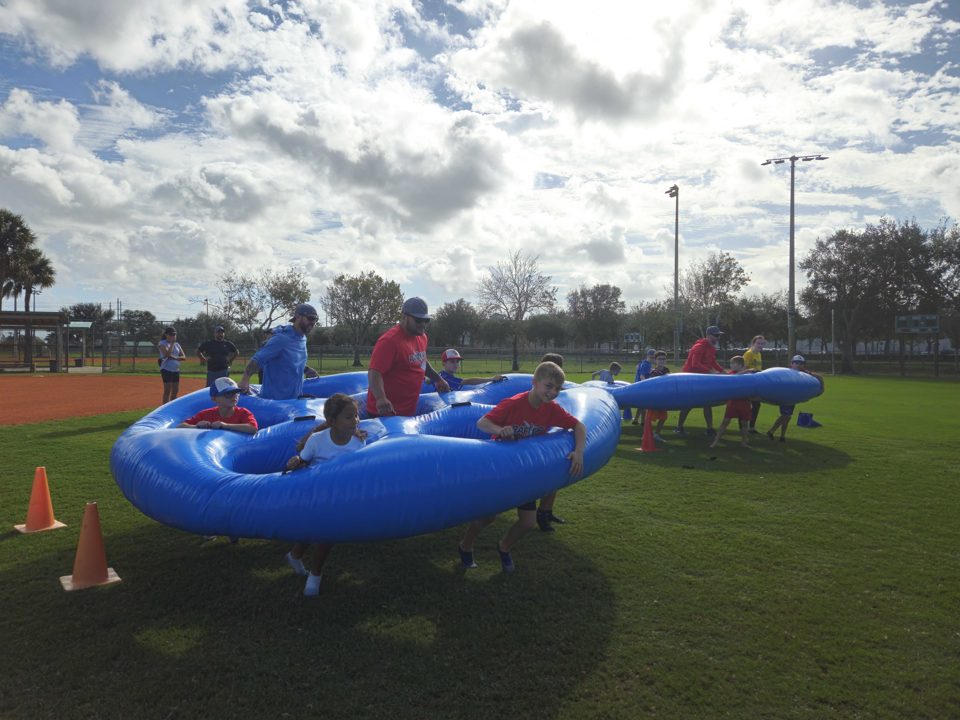 Kids playing Crazy Games interactive games at a real Palm Beach County event