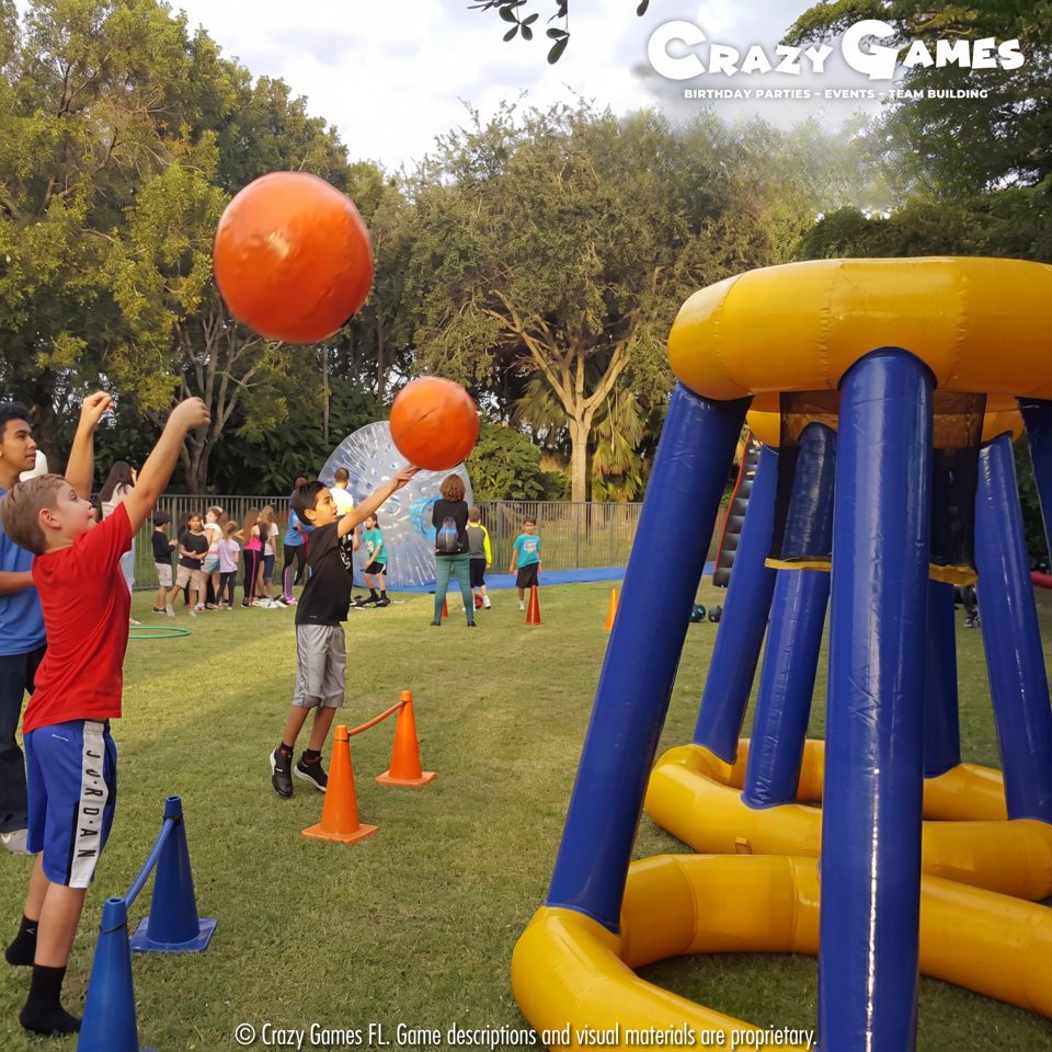 Kids playing Crazy Games interactive games at a real Palm Beach County event