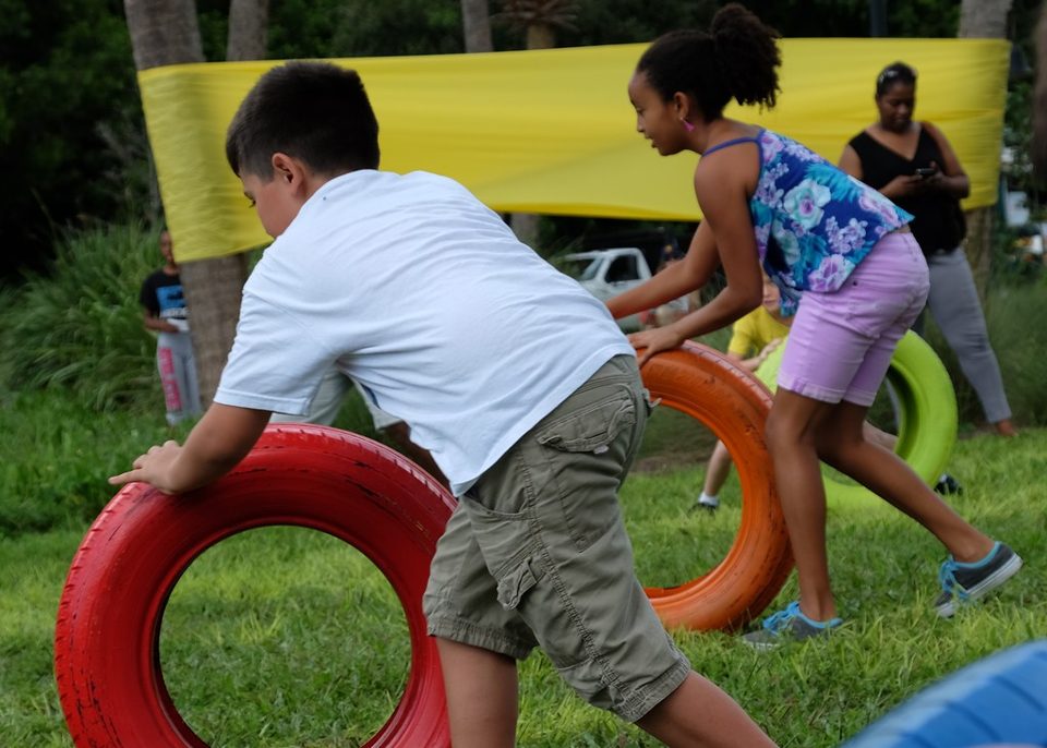 Kids playing Crazy Games interactive games at a real Palm Beach County event
